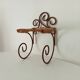 Antique wrought iron wall shelf