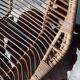 Rattan armchair and black metal base 1960