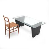 Coffee table with a glass top and black stained wood frame, 1930s.