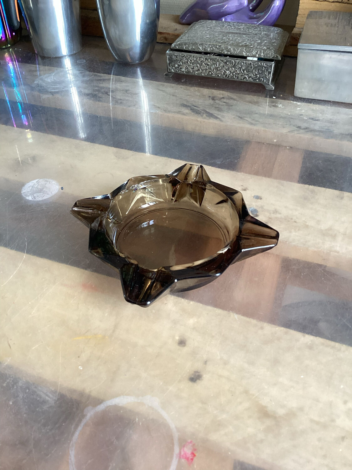 Empty ashtray vintage smoked glass pocket