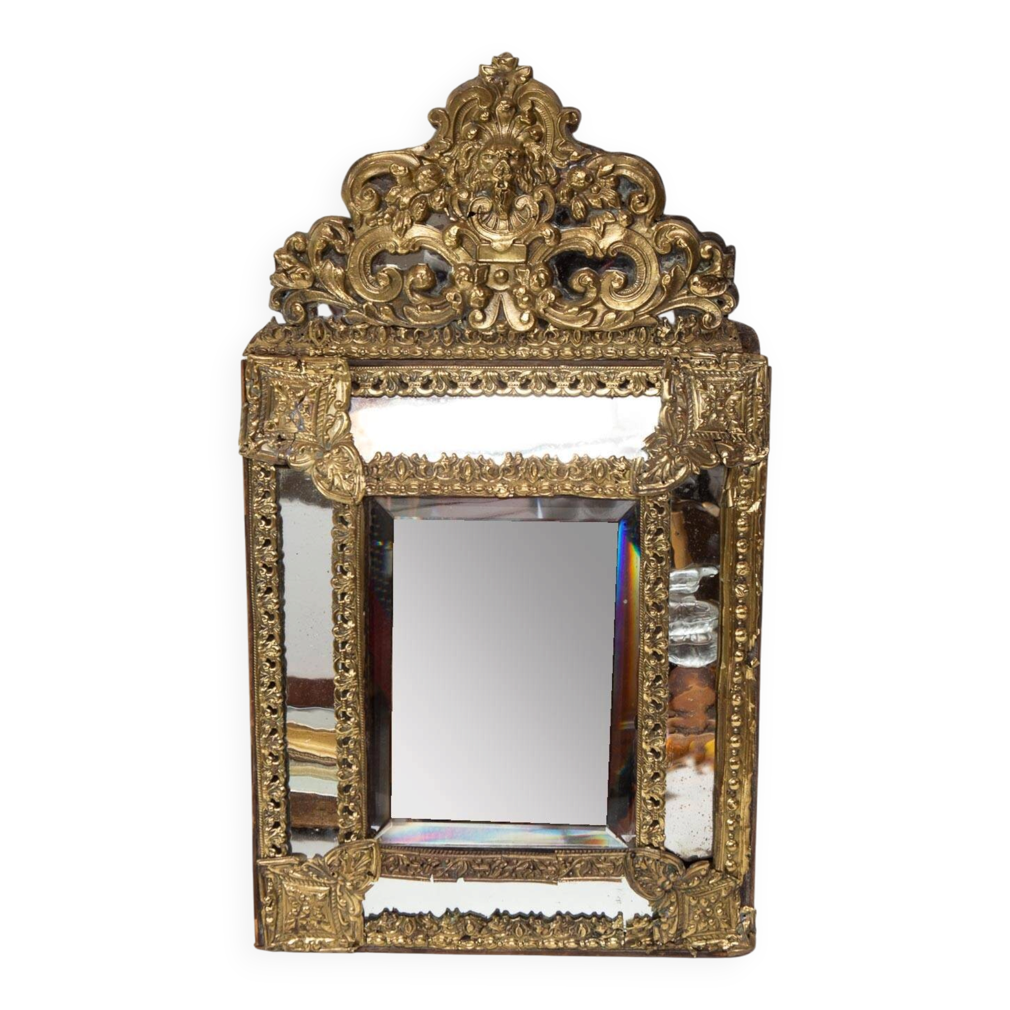 Antique French mirror in repoussé brass with a 19th-century pediment (60*34 cm)