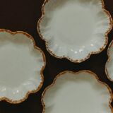 Set of eight small bread plates in white Limoges porcelain