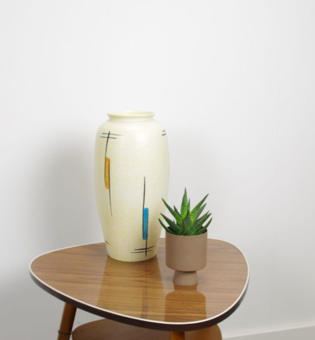 Vintage vase in light yellow porcelain