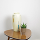 Vintage vase in light yellow porcelain