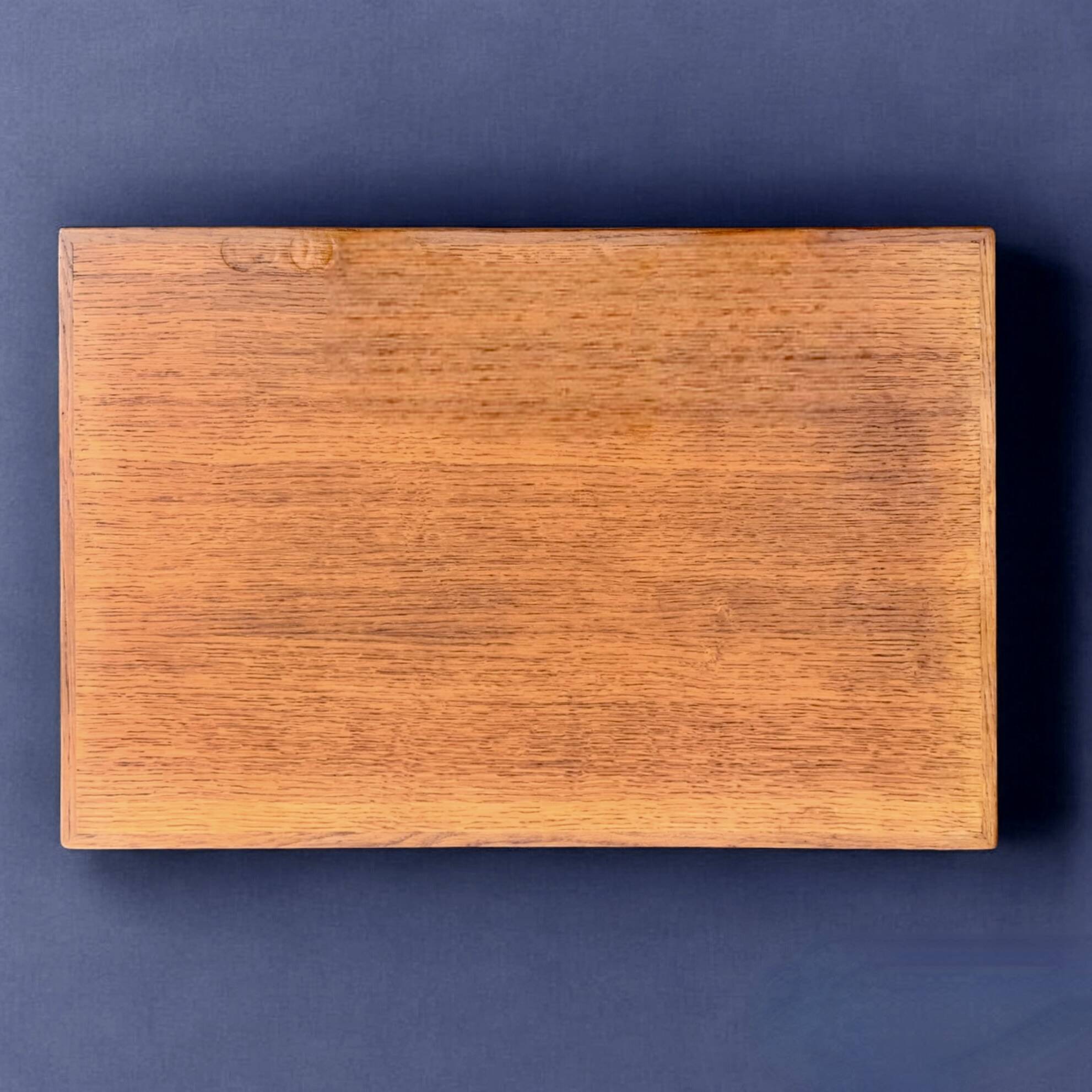 Varnished wooden trolley on wheels