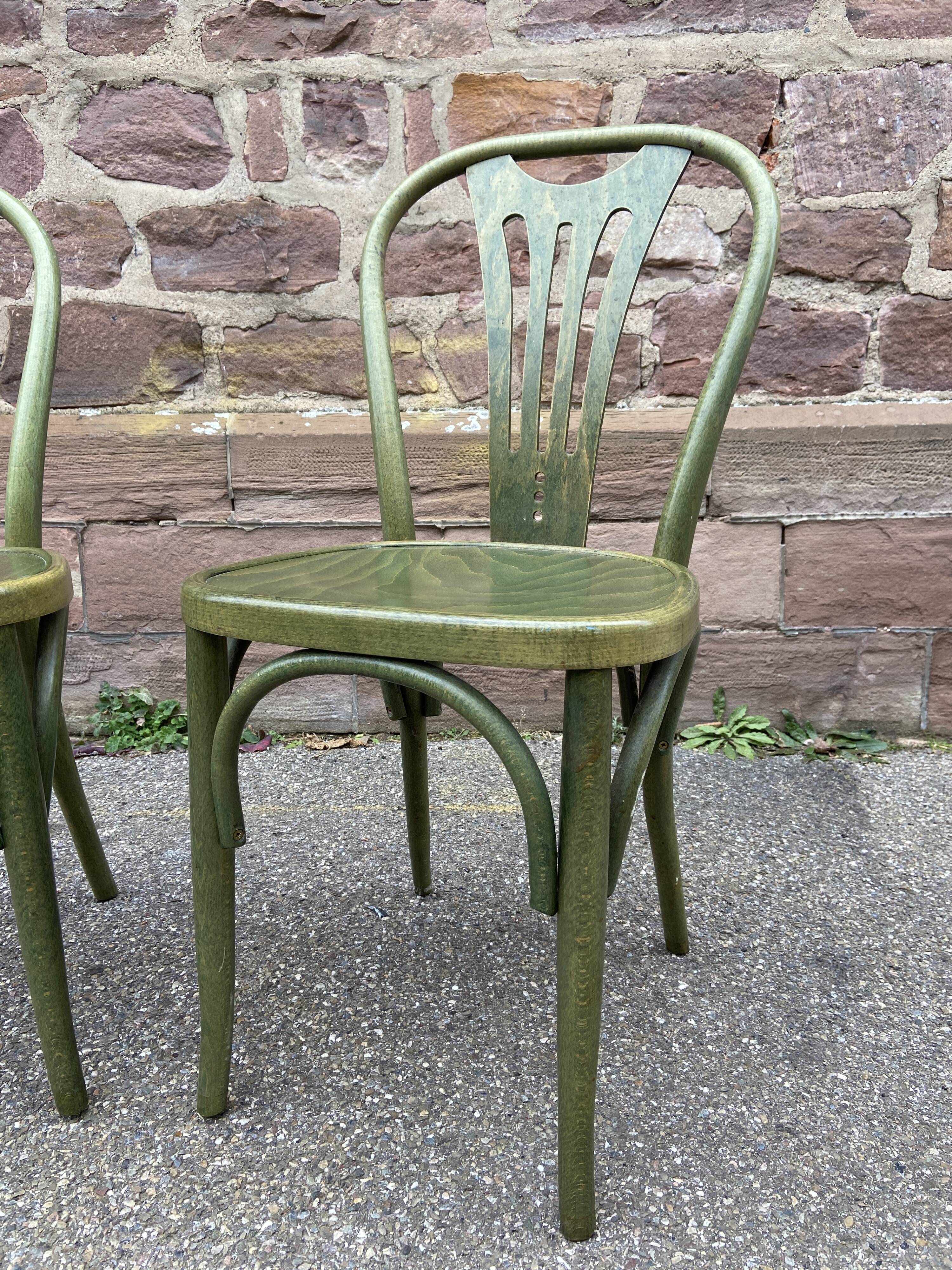 2 curved wooden bistro chairs