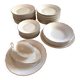 Service of 53 pieces of plates and dishes by Villeroy & Boch in cream and gold, model Saar.