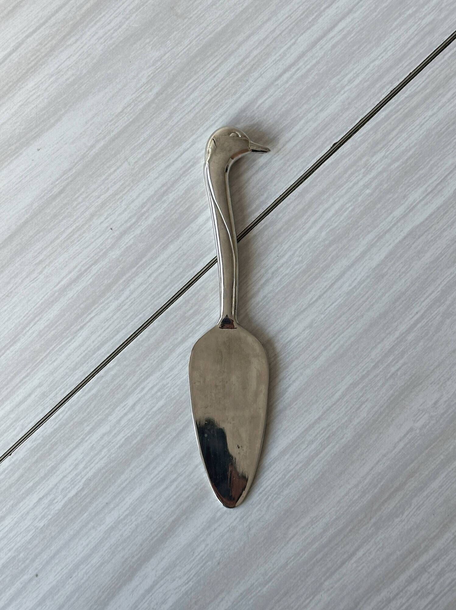 Metal foie gras spoon