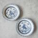 Pair of antique Chinese decorative plates with dragon motif.