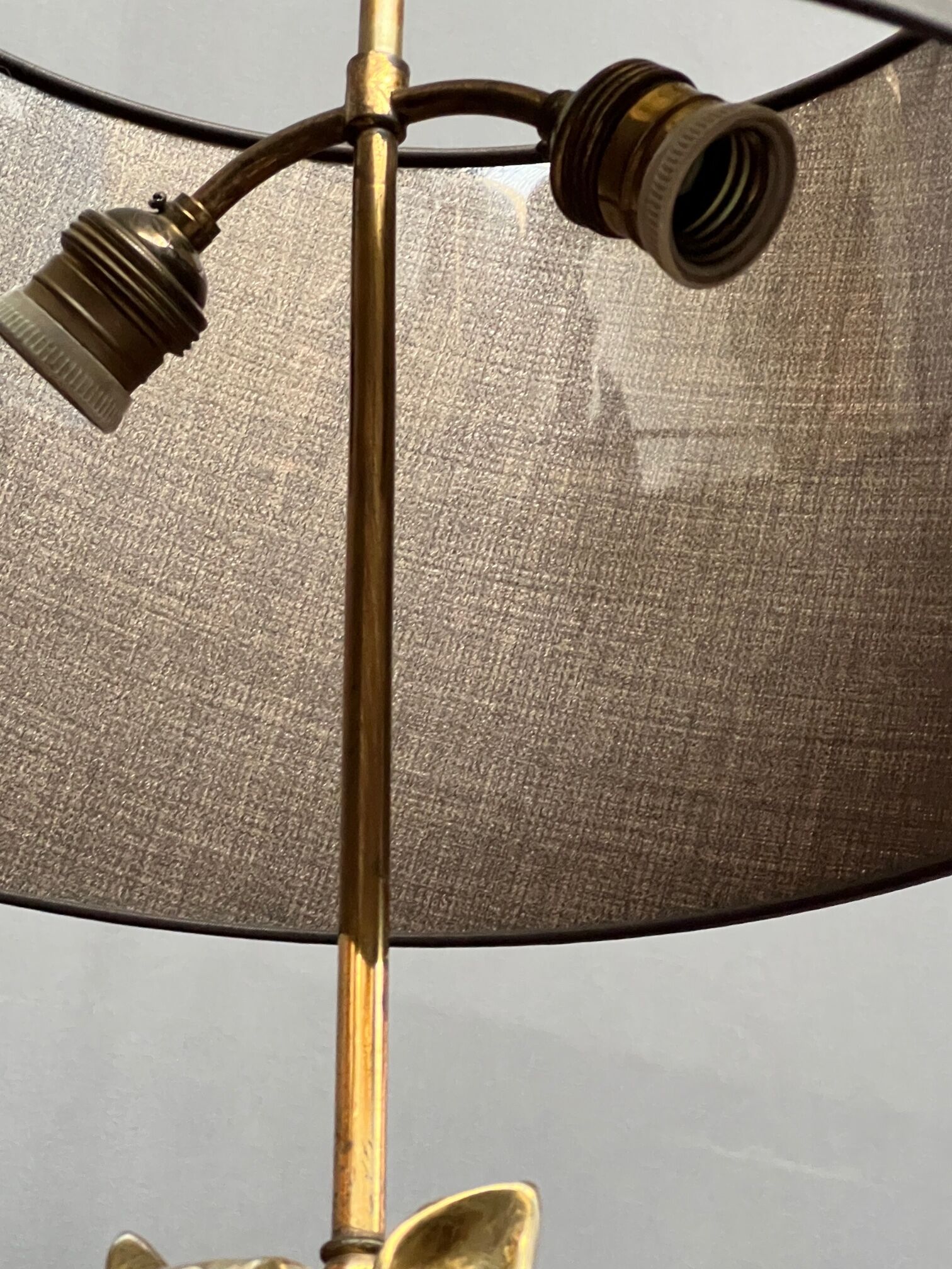 Table lamp made of solid bronze on a marble base.