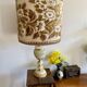 Antique table lamp in marble and tapestry