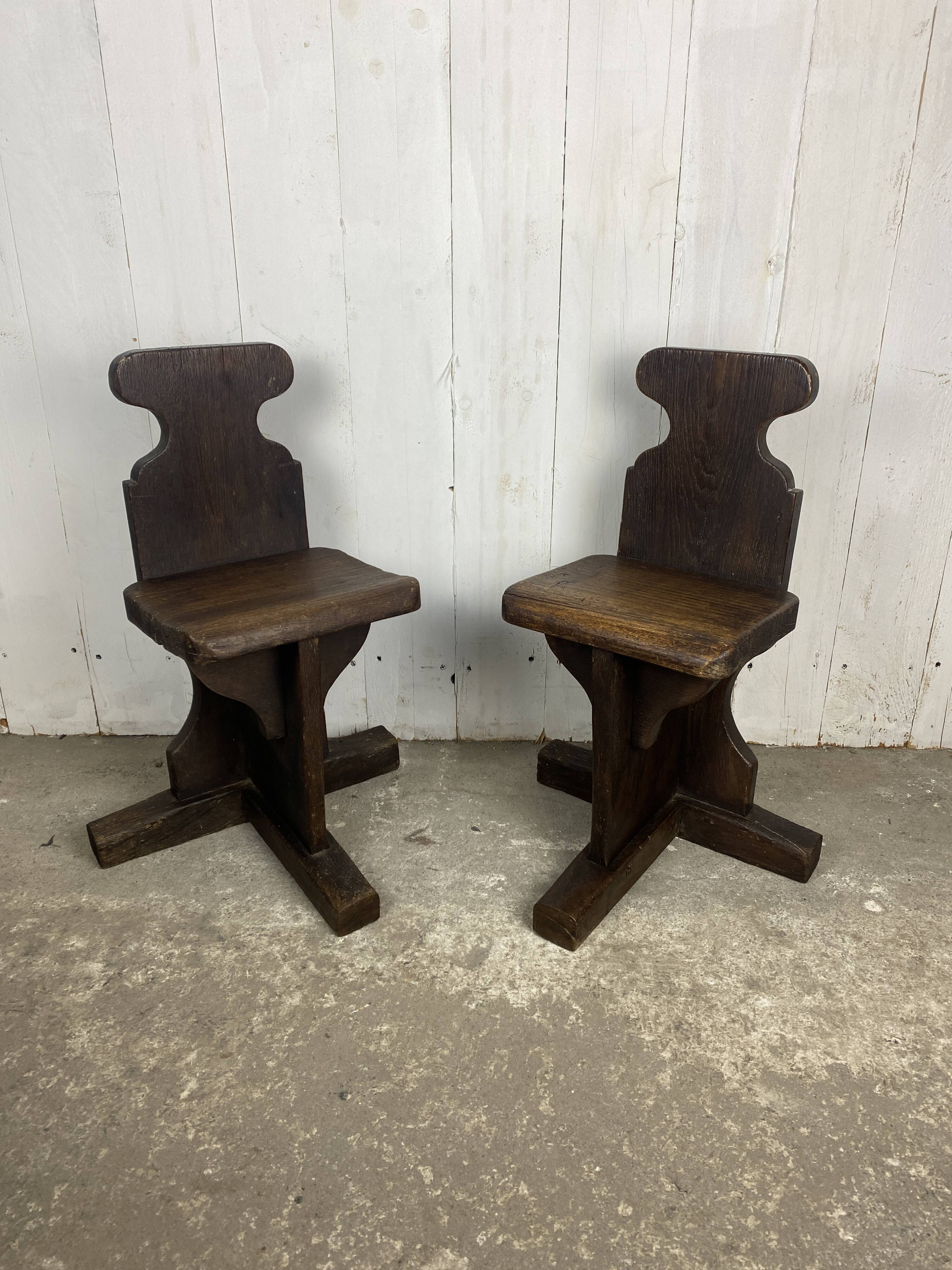 Pair of brutalist oak stools