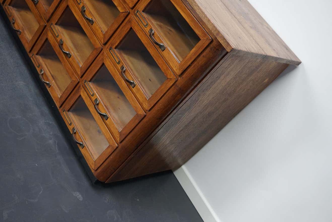 Vintage dutch oak haberdashery cabinet 1930s