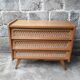 Commode vintage en rotin pieds compas