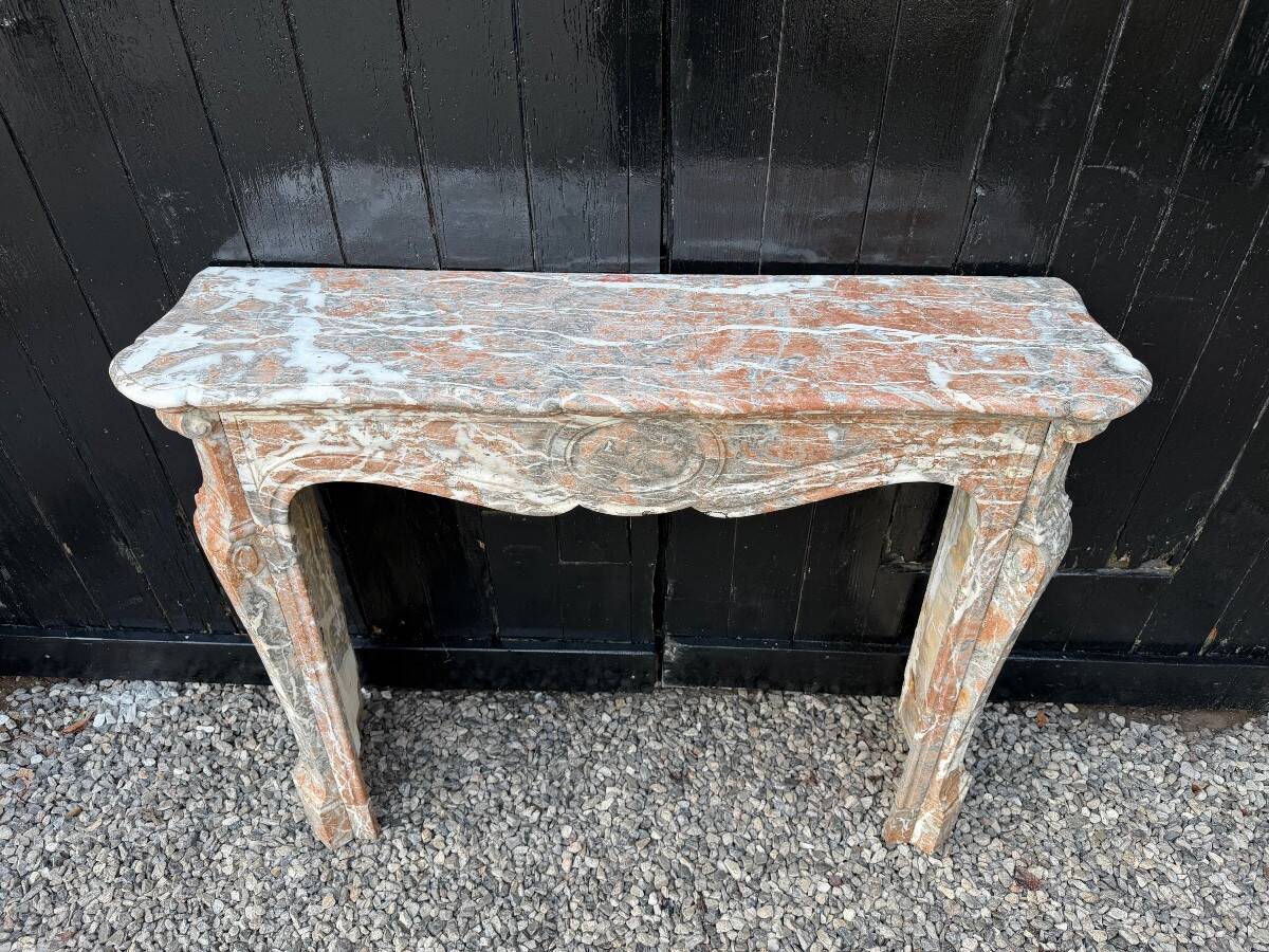Louis XV style fireplace in grey Ardennes marble, circa 1900.