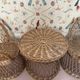 Table and two wicker chairs for children.