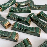 12 vintage green and gold ceramic knife holders from the 50s