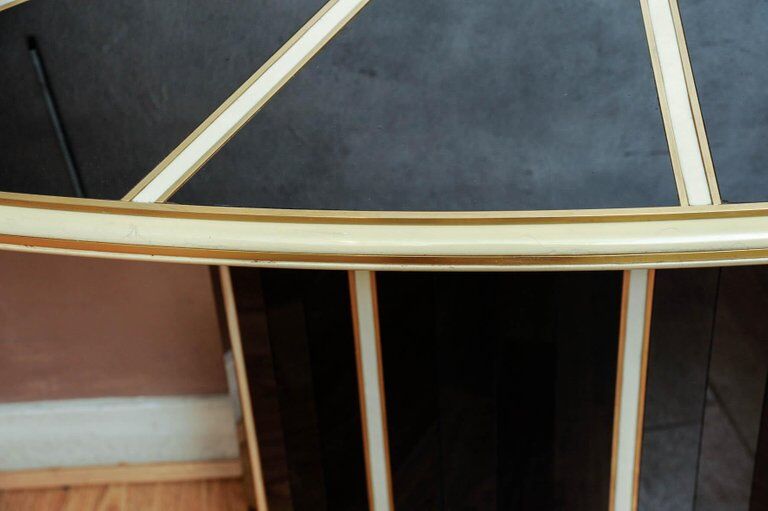 Console in black and cream tinted glass