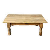 Table basse vintage en bois massif brut avec pieds sculptés