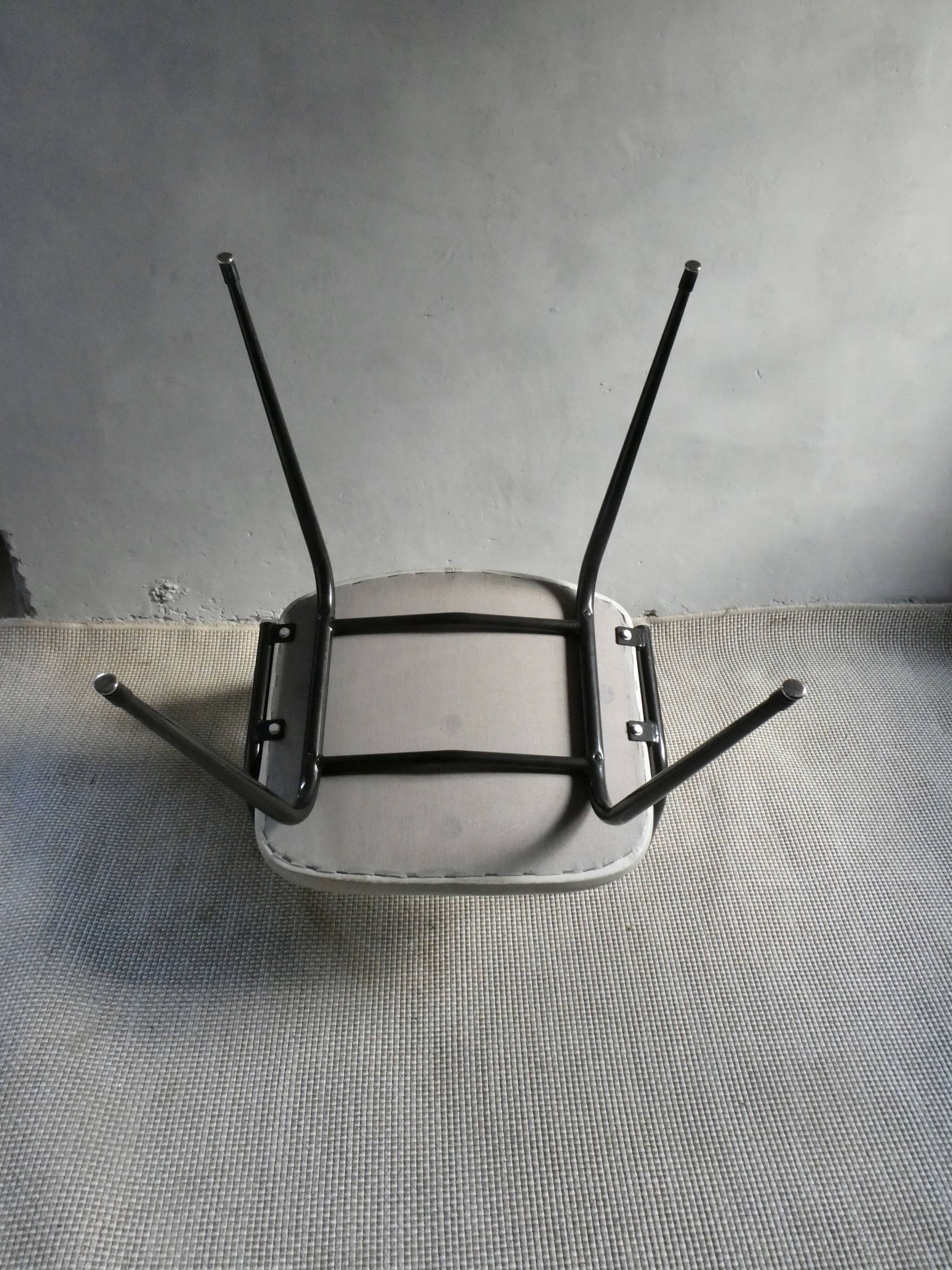 Skai armchair and black metal compass legs, 1960s