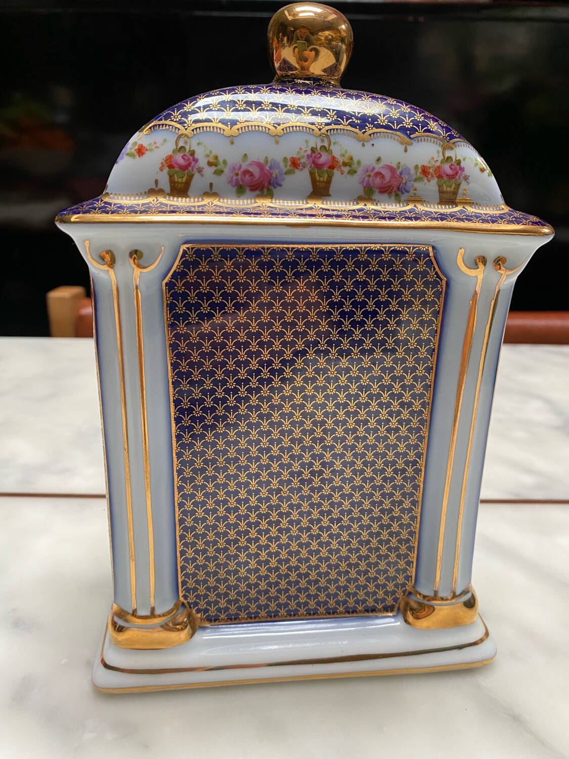 English porcelain clock and candle holders