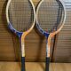 Pair of vintage wooden tennis rackets for cadet junior sport courier