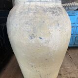 Yellow patinated cement grain jar