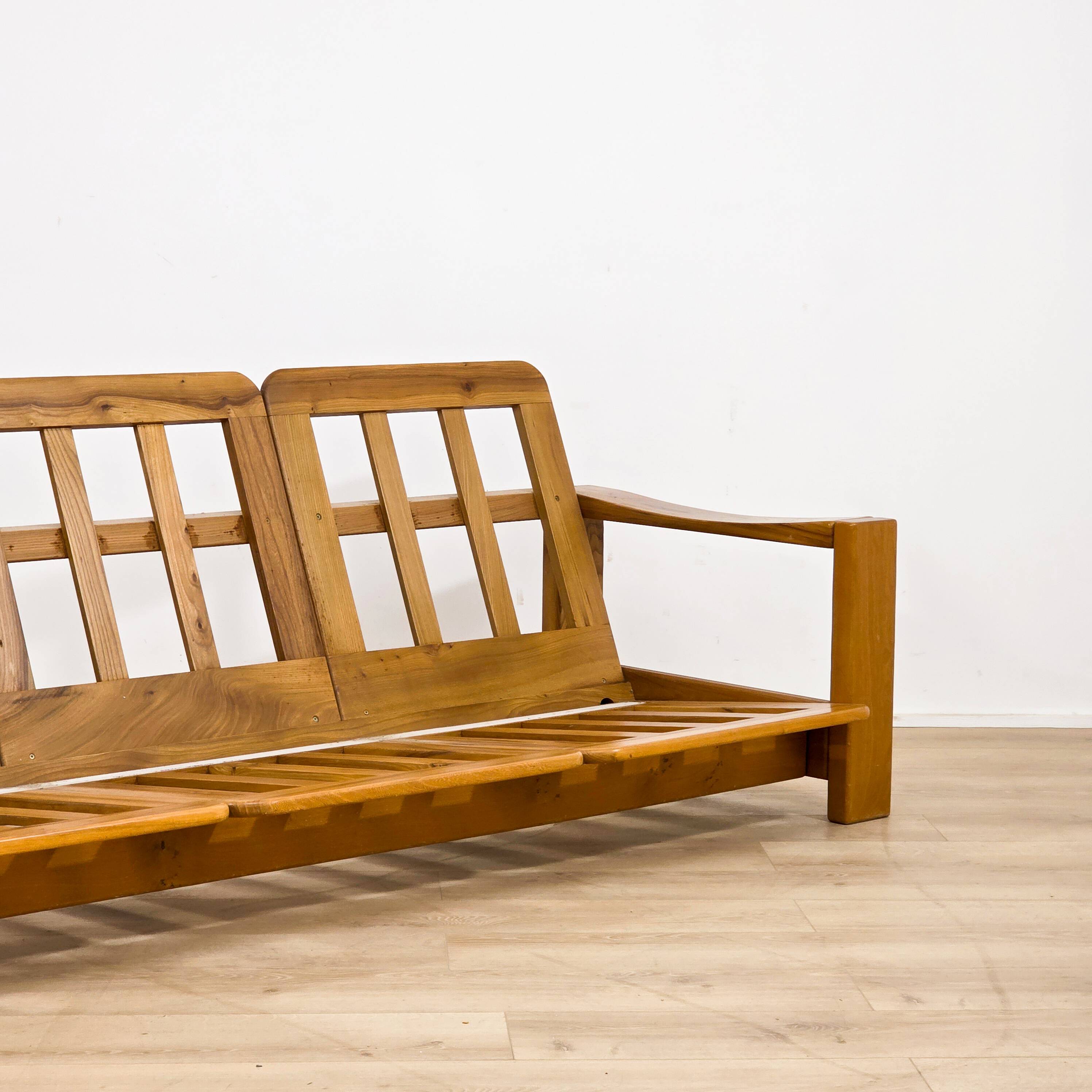 Solid elm sofa by Maison Regain from the 1970s.