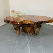 Brutalist Wabi Sabi mid-century coffee table made of natural biological burl wood.