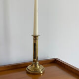 Old brass push candle holder