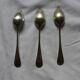 10 small silver spoons