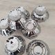 10 stainless steel dessert / ice cream bowls in Guy Degrenne style, flower shape.