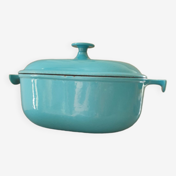 Le Creuset oval enameled cast iron casserole dish made in France, blue color