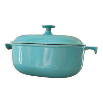 Le Creuset oval enameled cast iron casserole dish made in France, blue color