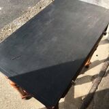 Antique black wooden console, central drawer and turned legs, 19th-century style.