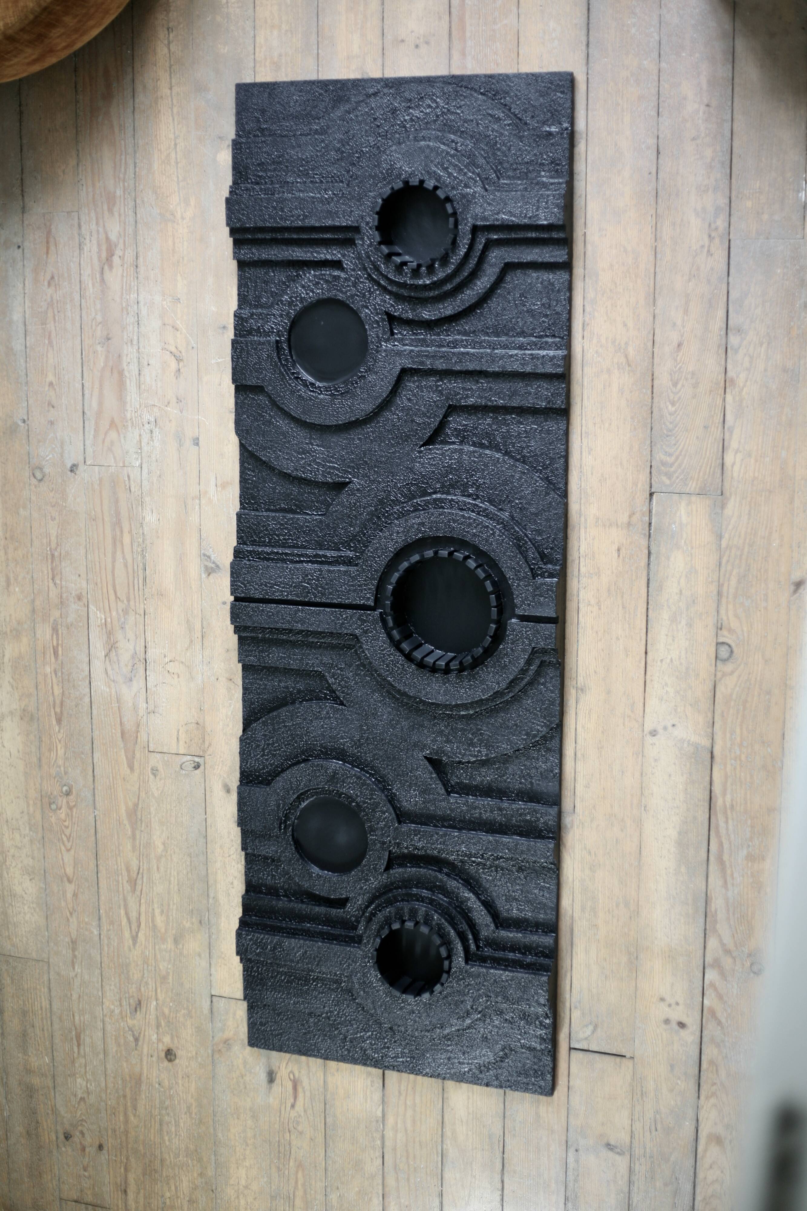 Wall sculpture, wood and black coating, late 1970s
