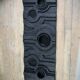 Wall sculpture, wood and black coating, late 1970s