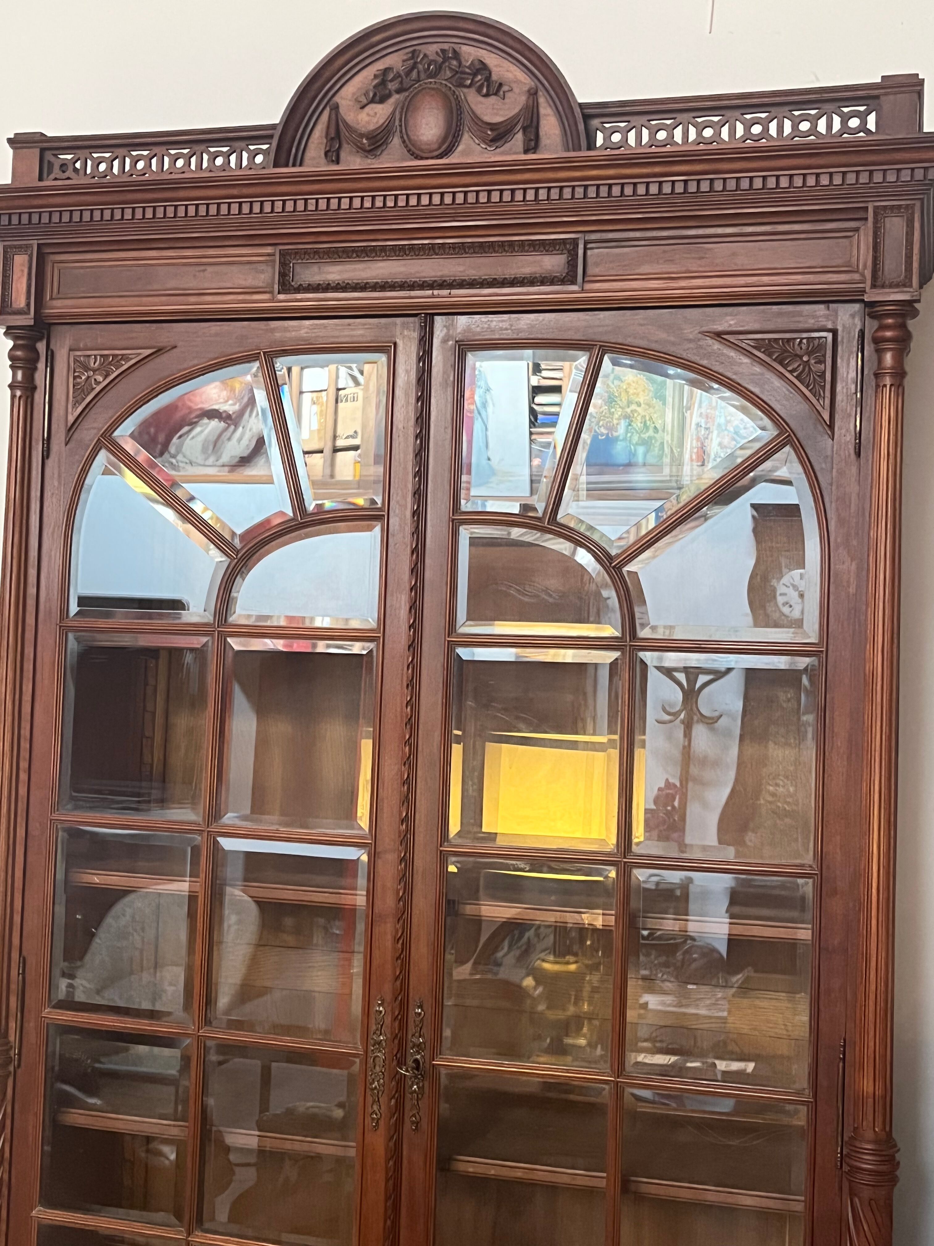 Louis XVI style beveled glass bookcase