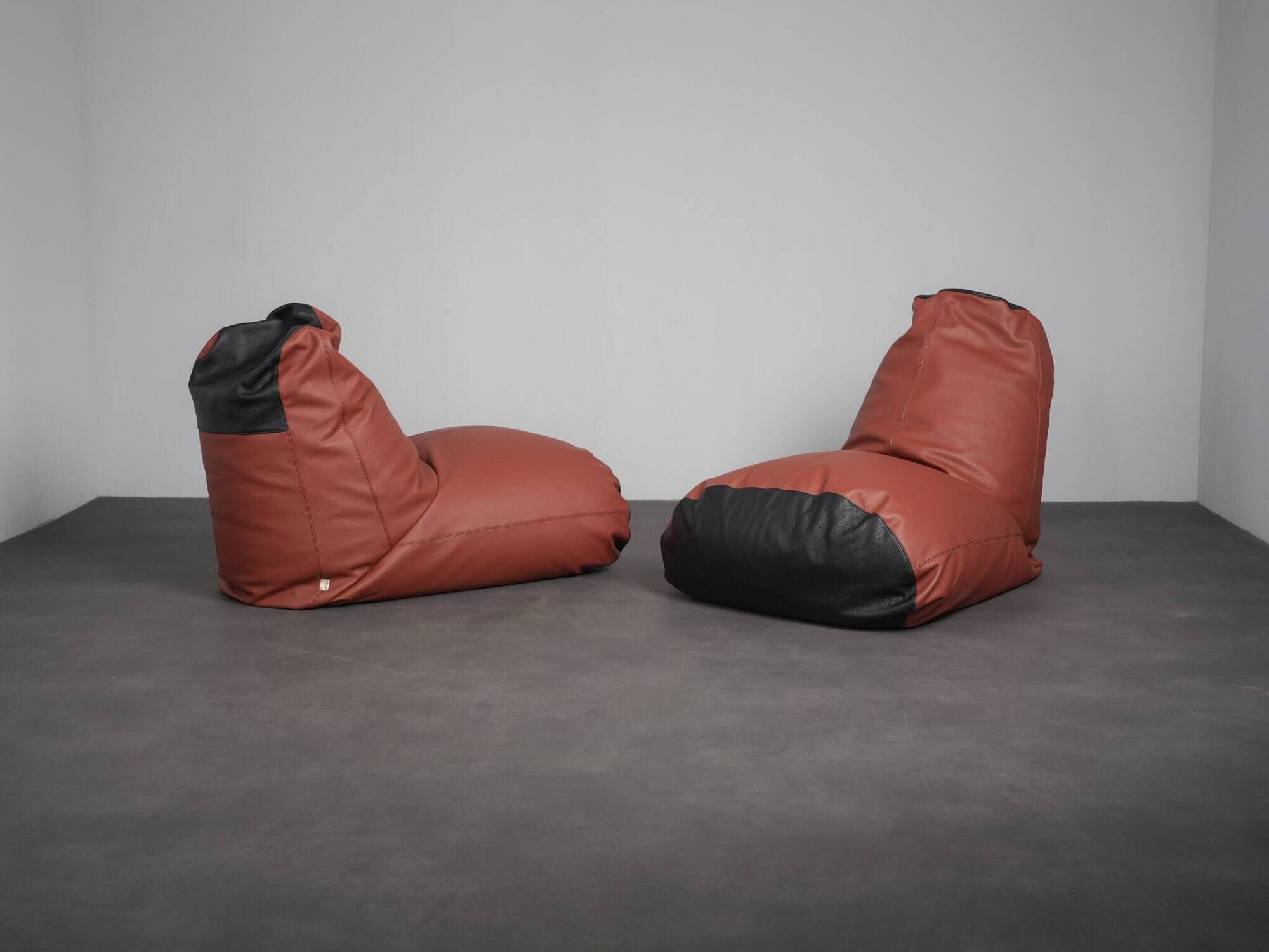 Pair of Boya leather lounge chairs by Roderick Vos for Pode, Netherlands, 2016
