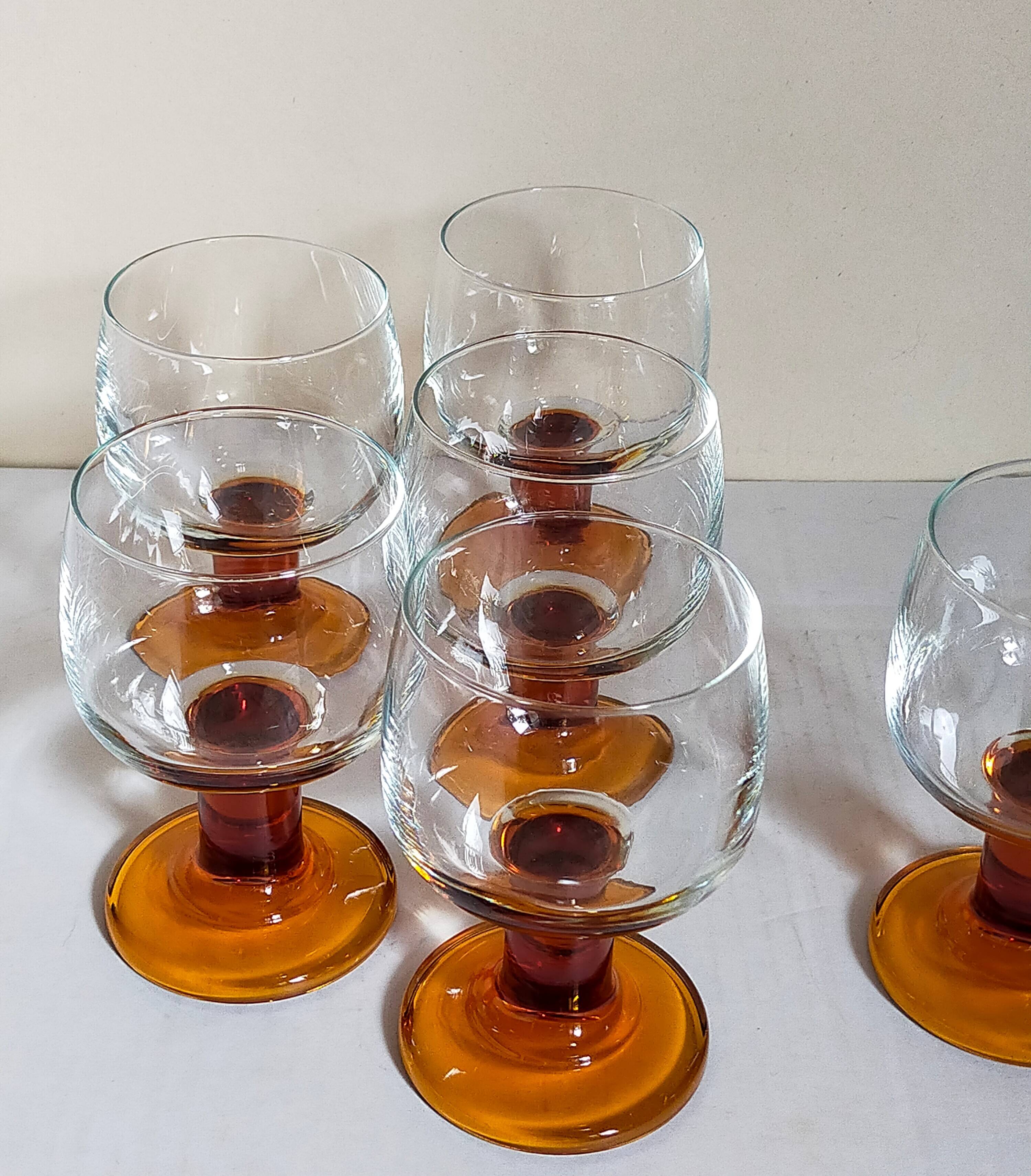 Six amber stemmed glasses from the 70s