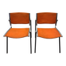 Pair of orange Vaghi Uno chairs