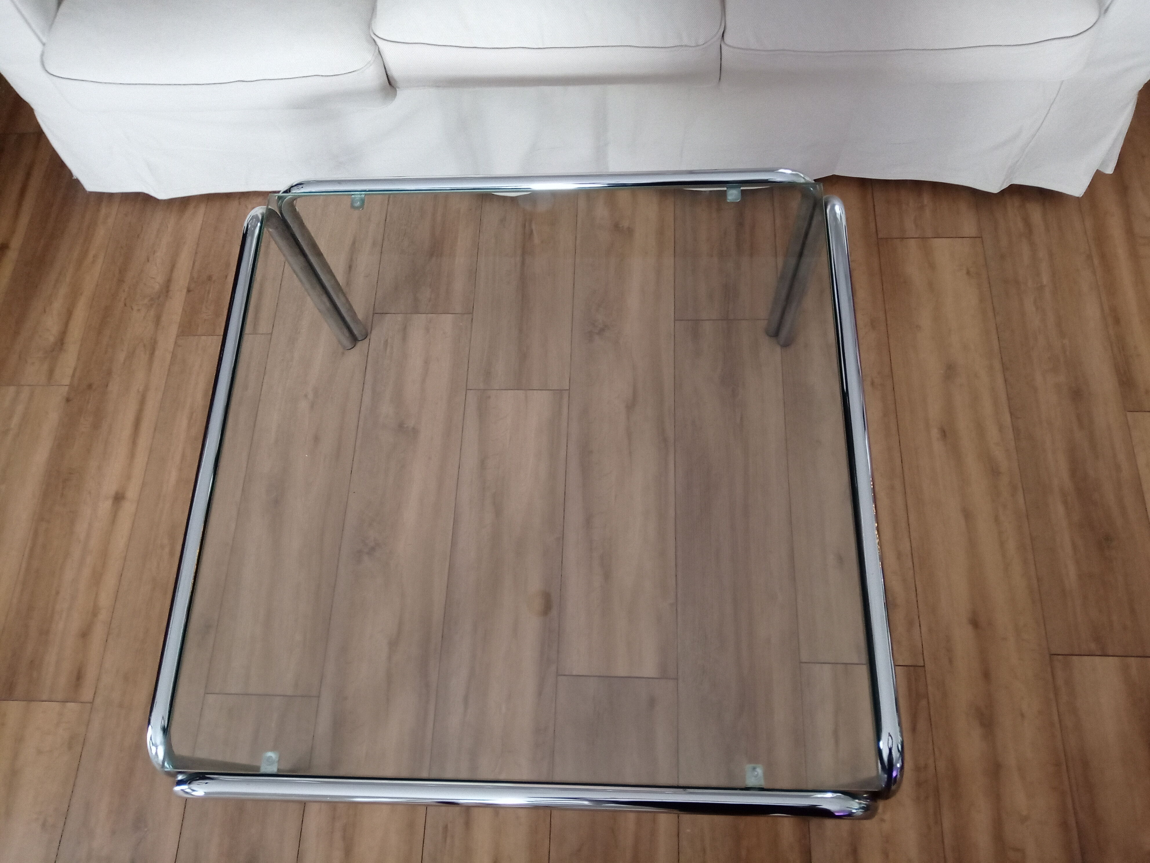 Table basse carrée vintage années 70 plateau en verre transparent et pieds chromé
