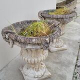 Pair of planter vases decorated with faces in reconstituted stone 1950s