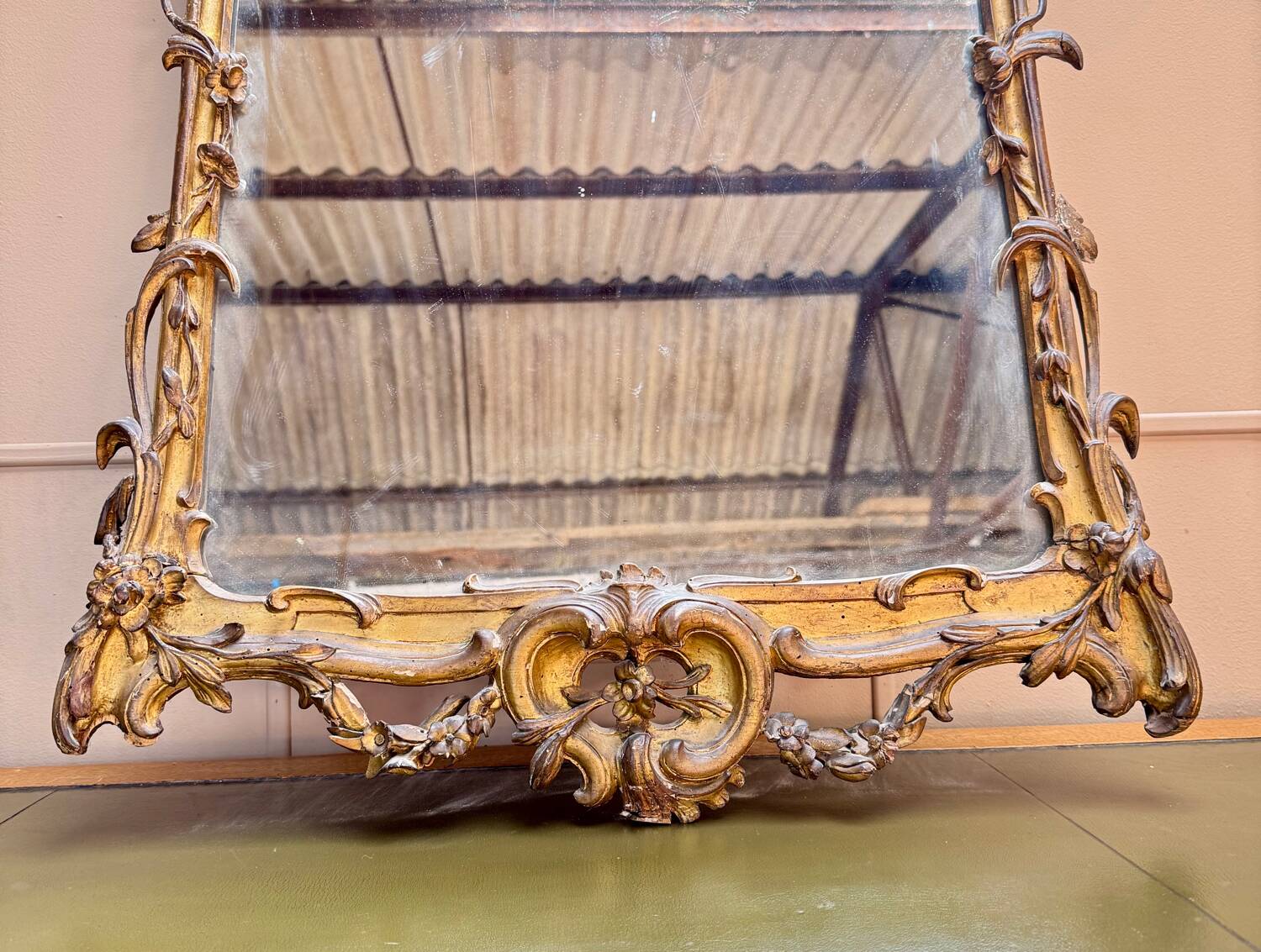 Louis XV period wooden and gilded stucco mirror, 18th century