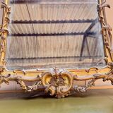 Louis XV period wooden and gilded stucco mirror, 18th century