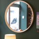 Large vintage circular mirror, plastic frame.