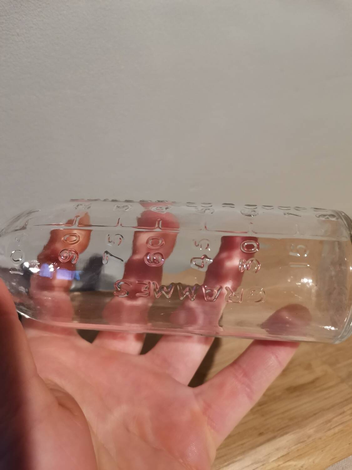 Vintage molded glass graduated apothecary pharmacy bottle