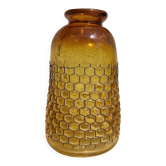 Artisanal amber blown glass vase with integrated honeycomb structure.