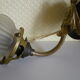 Wall lamps, opaque corolla and iridescent ochre lampshade, brass and wood support