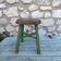 Old stool in fir folk art